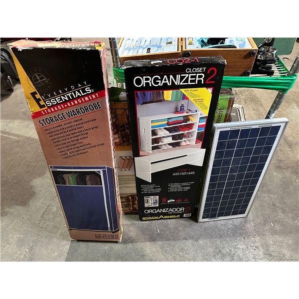 Group of assorted closet organizers and solar panel