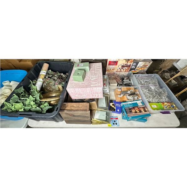 Table top full of assorted wedding decorative supplies - Christmas lights/ silver string lights/ LED