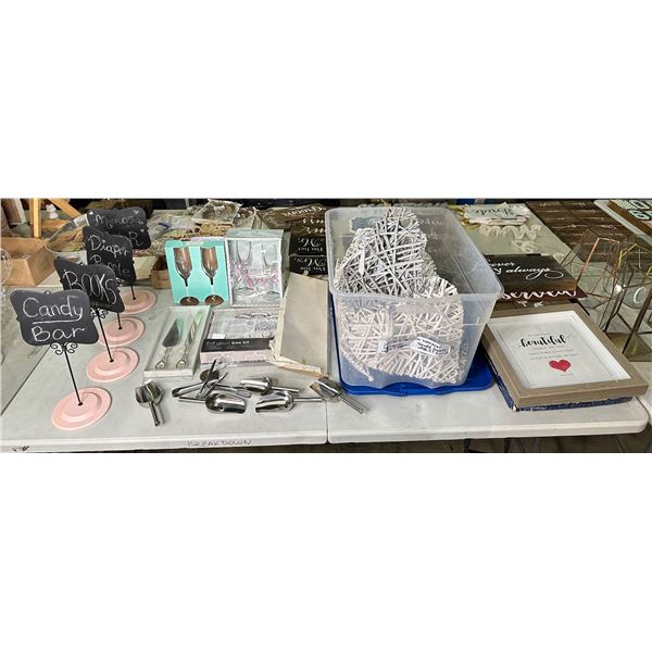 Group of assorted decor items including - wooden hearts, wedding decor signs, champagne glasses, sig