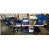 Image 1 : Large group of assorted bins including - a bin full of tank tops (various sizes), hangers, bras, pla