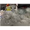 Image 2 : Table top of assorted glassware including - bowls, trays, vase, lids, etc... (approx 25 pieces)