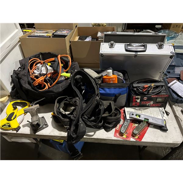 Large table lot of including - Utility knives, 61 10 battery charger, hammer, Stanley long tape, jum