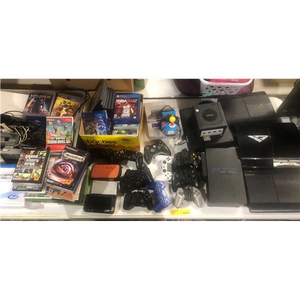 Table top full of PlayStation consoles & games includes - PS2, PS3, Nintendo Gamecube, super Nintend