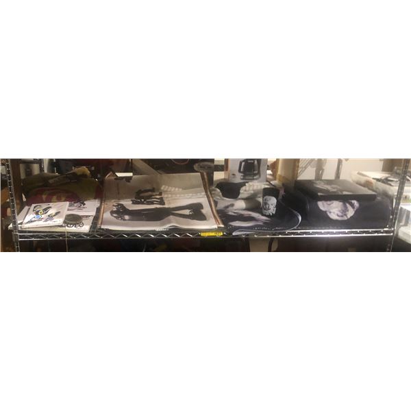 Shelf lot of Marilyn Monroe merchandise, native art on canvas, posters, etc...