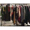 Image 1 : Rack lot full of assorted clothes - includes womens Calvin Klein sweaters & hoodies / womens & mens 
