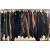 Image 1 : Rack lot full of assorted clothes - includes high end men & women jackets / cardigans / Adidas sweat