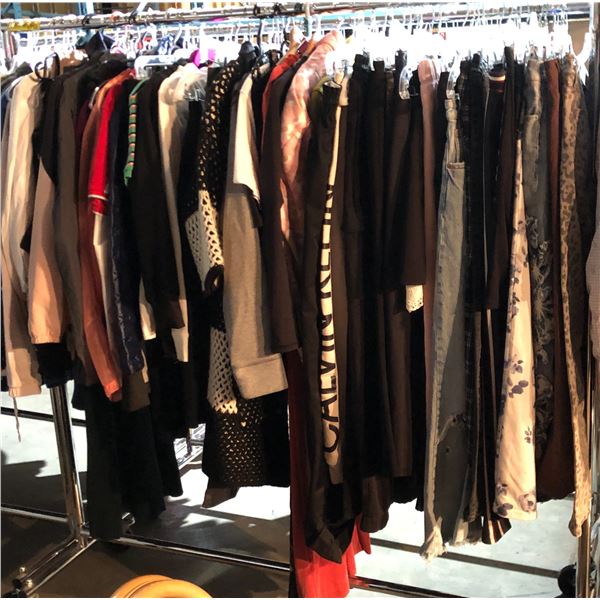 Rack lot full of assorted clothes - includes high end jackets & sweaters / Guess jacket / Kappa swea