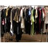 Image 1 : Rack lot full of assorted clothes - includes black lace dress / men & women shirts & sweaters / tank