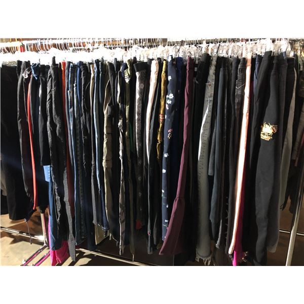 Rack lot full of assorted pants - includes jeans / joggers / cargo pants / sweatpants / shorts etc (
