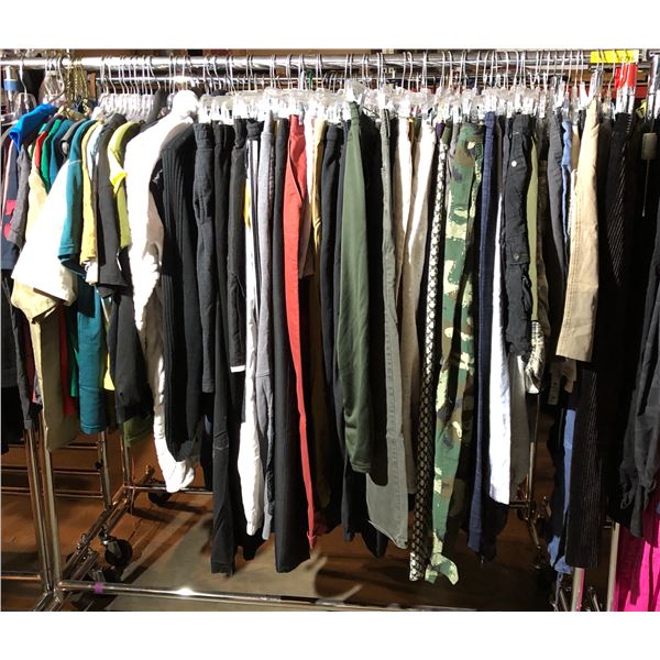 Rack lot full of assorted clothes - includes polo shirts / Reebok long sleeves / dress pants / jeans