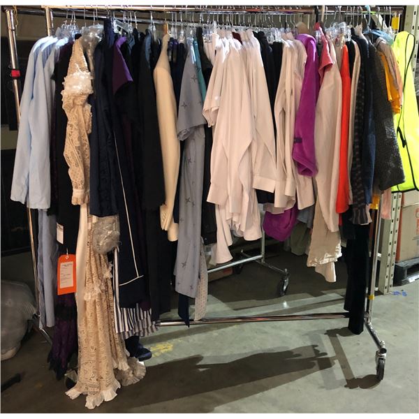 Rack lot full of assorted clothes - includes safety vests / white dress shirts / wedding dress etc (