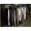 Image 1 : "Supernatural" - Rack full of assorted set dec wardrobe includes winter jackets/ hoodies/ sweaters (