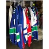 Image 3 : Group of assorted sports jerseys & merchandise - Vancouver Canucks Kesler #17/ Blue Jays/ Chicago Bl