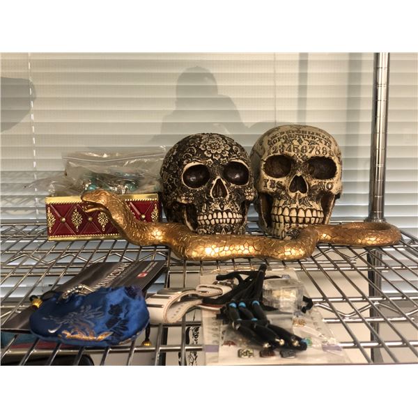 Group of assorted items - includes box of jewelry / 2 Halloween human skulls etc