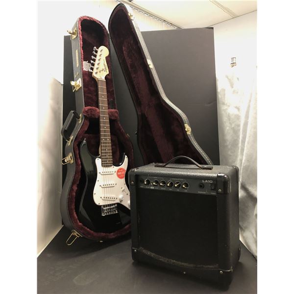 Squier Mini - electric guitar by Fender w/ guitar case & amplifiier - s/n ICS17179171