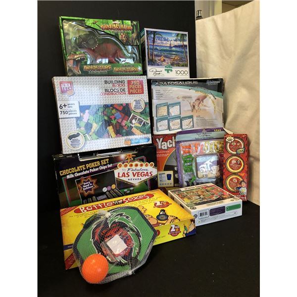 Group of assorted toys / games & puzzles - includes Dinosaur Montoy / Chocolate poker set / Yacht /