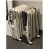 Image 1 : Group of 2 portable electric oil heaters - includes Garrison model - 043-5863-4 &
