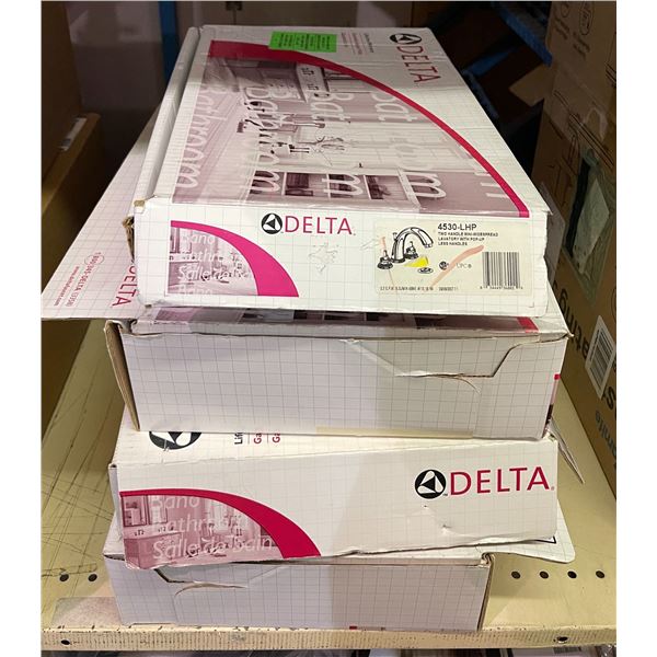 4 boxes of new Delta faucets/plumbing items