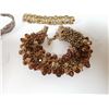 Image 3 : Eye catching braclets, one is antique beads