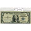 Image 1 : U.S. 1935E $1 Silver Certificate. Blue Seal. At one time you could go to a U.S. bank and demand a U.