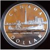 Image 1 : 1984 Toronto Silver Dollar. Proof with Ultra Heavy Cameo. Bright White. Housed in its original case 