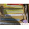 Image 2 : lot of rulers, clipboards, etc.