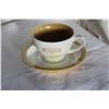 Image 1 : Tim Horton’s cup and saucer.  White and gold.