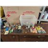 Image 1 : Bin of Misc Items including: Glass Jar / Cups / Can Opener / Mini RCMP / Mustex Rub