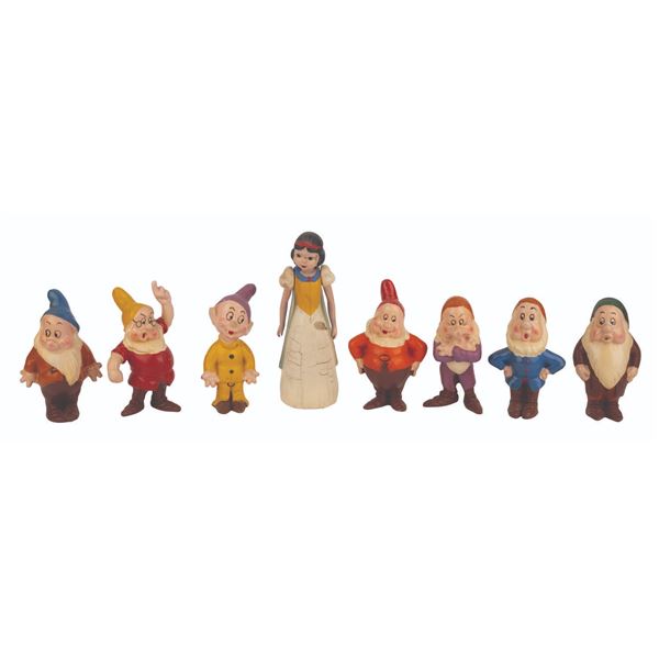 A Set of Snow White and the Seven Dwarfs Latex Figures.