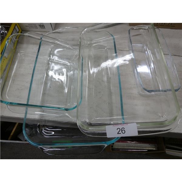 Assorted Pyrex glass cake pans