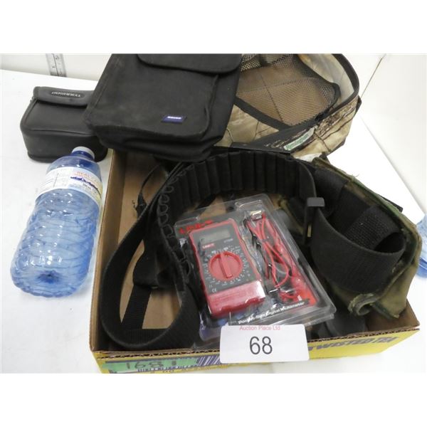 Assorted fanny packs, voltage meter