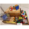 Image 1 : Rubics cubes & labeled boxes of school supplies