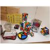 Image 3 : Rubics cubes & labeled boxes of school supplies