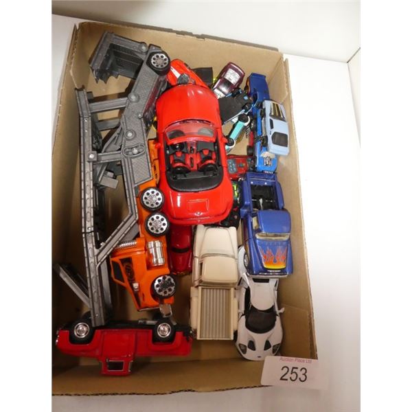 box of toy cars and trucks