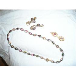 Necklace, earings, and droplets