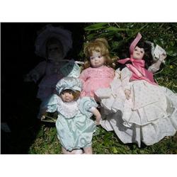 Set of 4 porcelain dolls