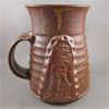 Image 1 : Handmade Pottery Mug with T-Rex Skeleton 5" Tall