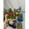 Image 6 : Lot of Various Teenage Mutant Ninja Turtles Toys and Books 