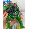 Image 7 : Lot of Various Teenage Mutant Ninja Turtles Toys and Books 