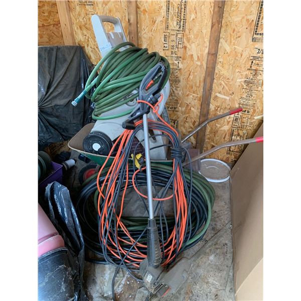 Assortment Of Hoses, Extention Cords, Weed Whacker, & Wheelbarrow