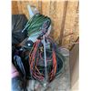 Image 1 : Assortment Of Hoses, Extention Cords, Weed Whacker, & Wheelbarrow