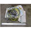 Image 1 : Small Tarp with Seed Bags and Trouble Light, Two Extension Cords