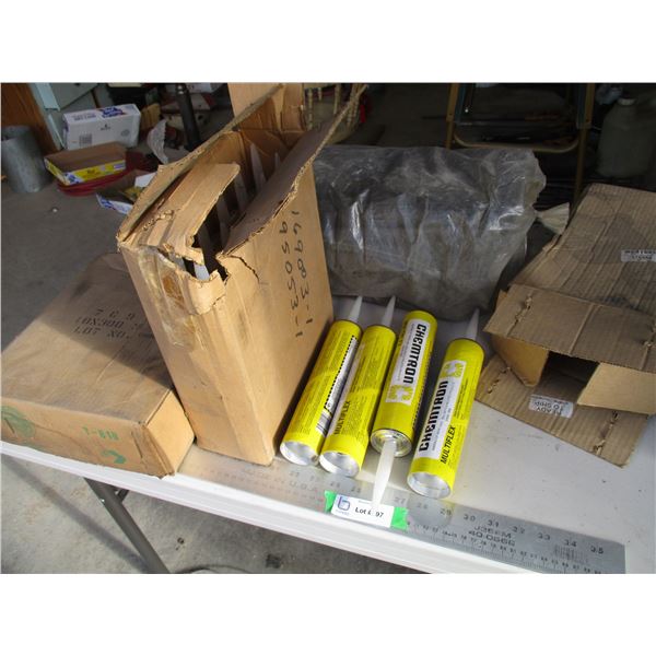 (2+) Boxes of Caulking (multiFlex Sealant) plus Tarp