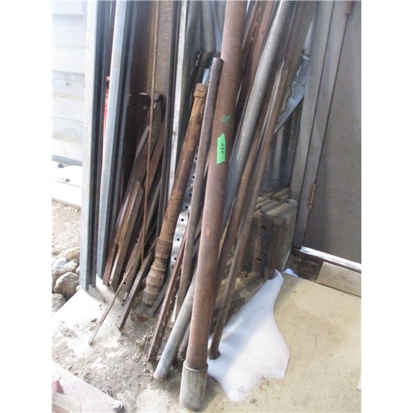 Scrap Iron by Walk-in Door of Quonset