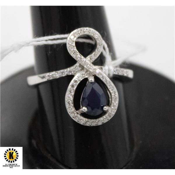 #18- HEATED BLUE SAPPHIRE& CZ  RING SIZE 9