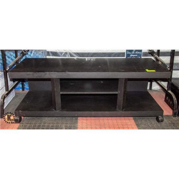 TV CONSOLE BLACK 49  X 17  X 15  ON WHEELS