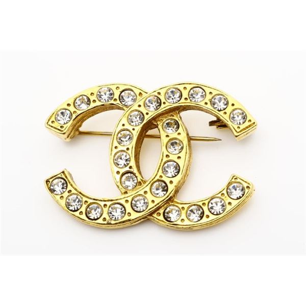 Chanel CC Brooch gold. rhinestones metal
