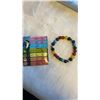 Image 2 : CHAKRA BRACELET W/ IONS OF MANIFESTATION BOOK AND COSMIC SOUL BOOK