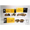 Image 1 : Four 1:50 scale Norscot diecast CAT toys including 16G grader, D250E articulated truck, AP-1000 asph