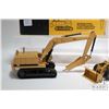 Image 2 : Three 1:50 scale NZG diecast CAT toys including 769D off highway truck, 245 excavator w/ hydraulic h